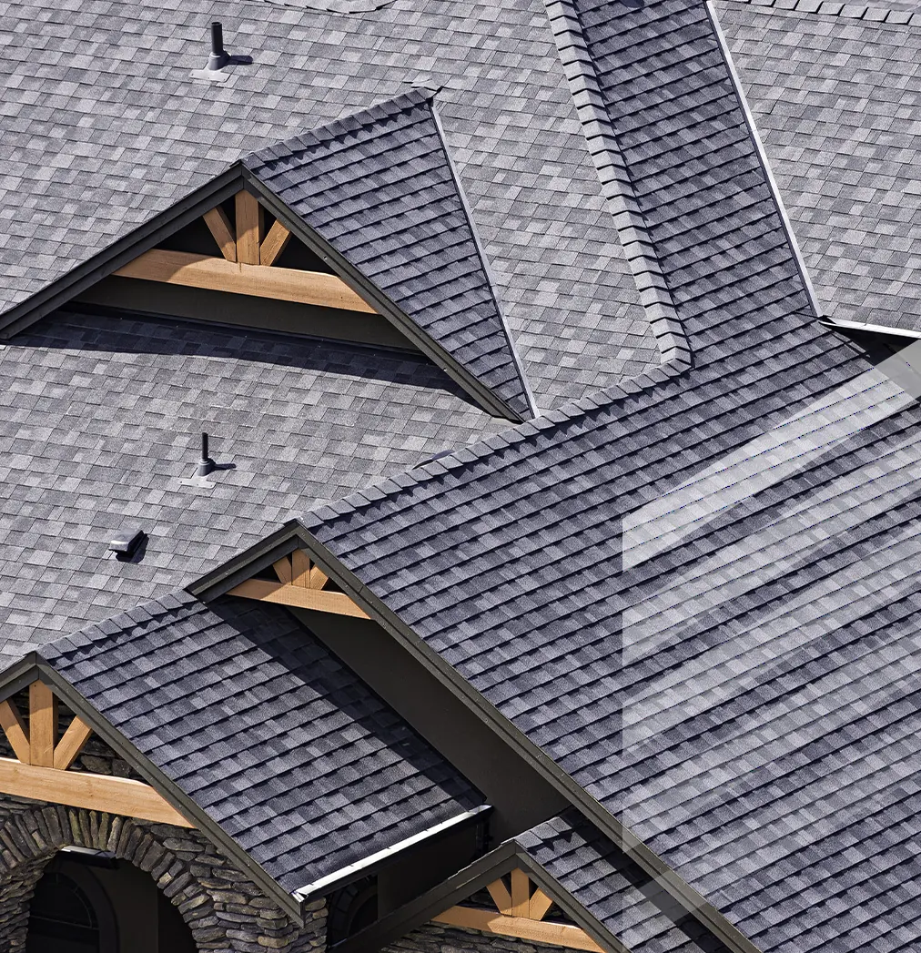 Newly installed asphalt shingle roof on a luxury home in Bergen County, NJ.